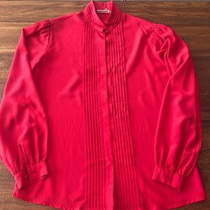 Beautiful red silk shirt with nice details at collar.Size 8 fits small to medium
